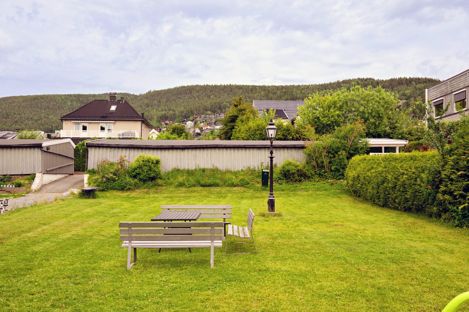 Sameiet har et pent grønt areal til bruk av beboerne. Galleribilde