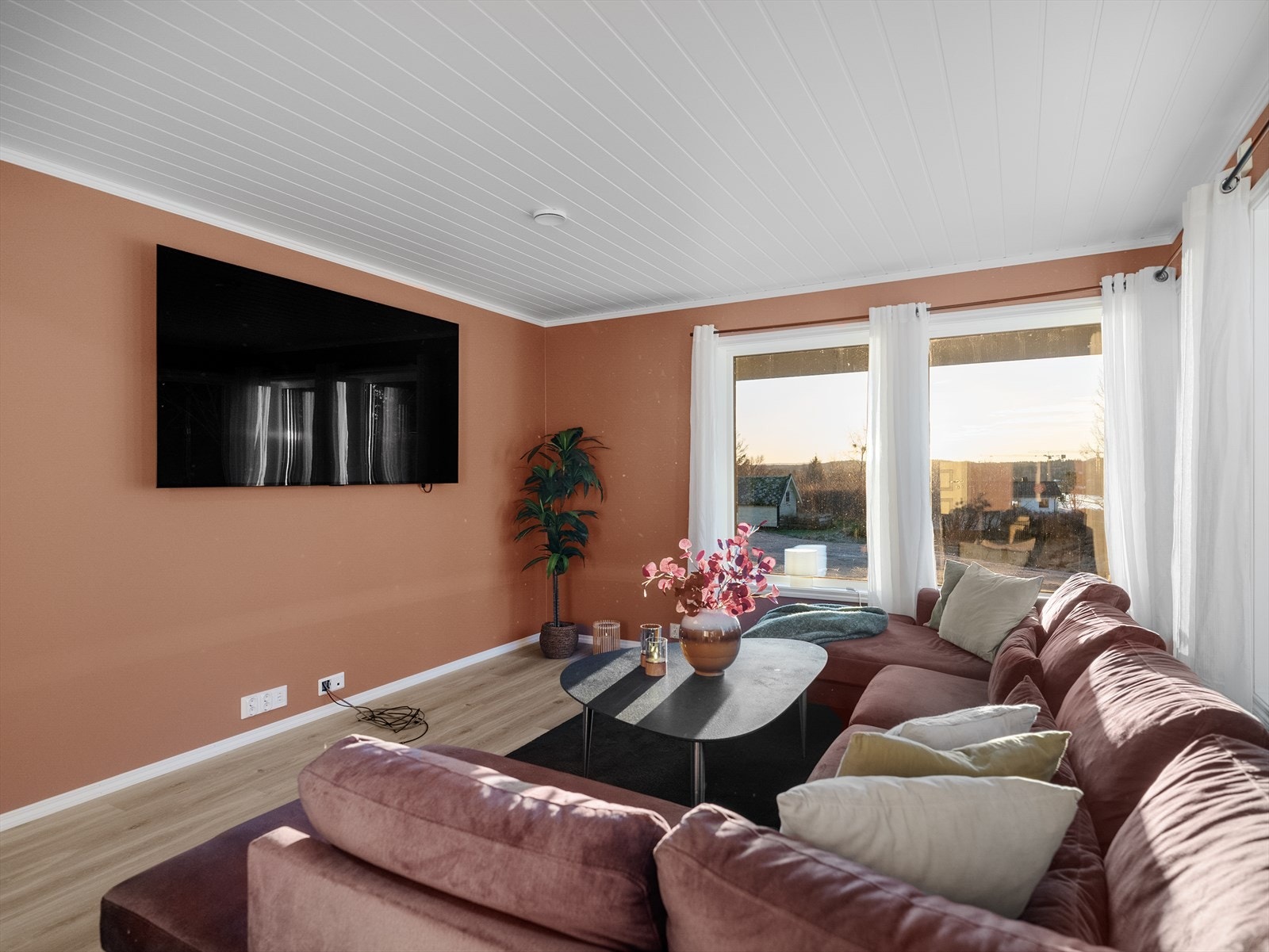 En innbydende stue med mange muligheter Galleribilde