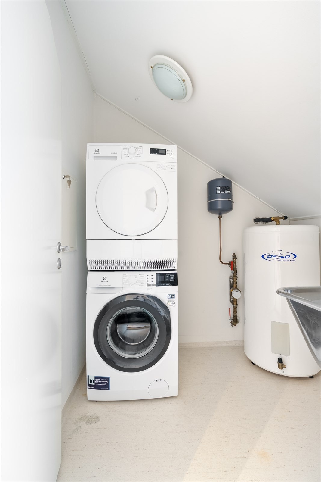 Praktisk vaskerom/bod Galleribilde