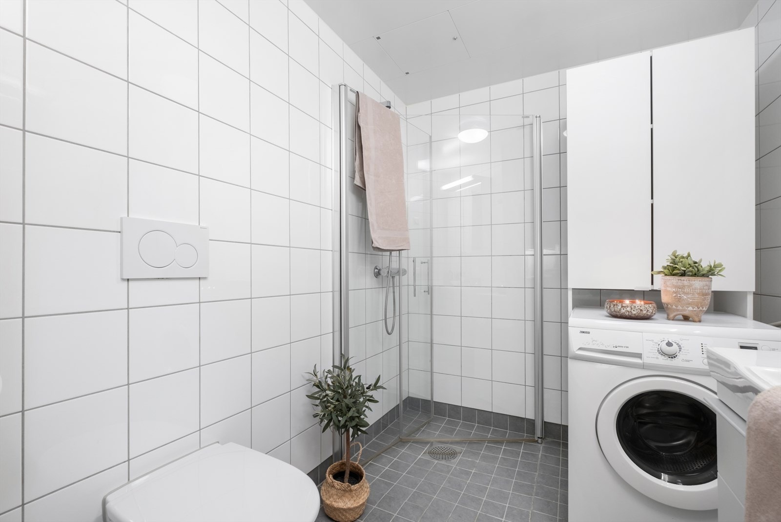 Badet har opplegg for vaskemaskin. Galleribilde