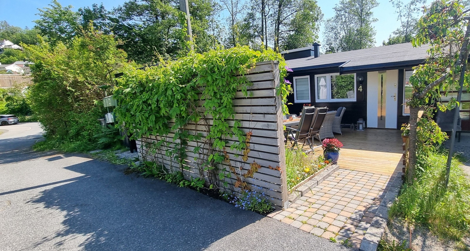 Inngangsparti selger privat bildet Galleribilde