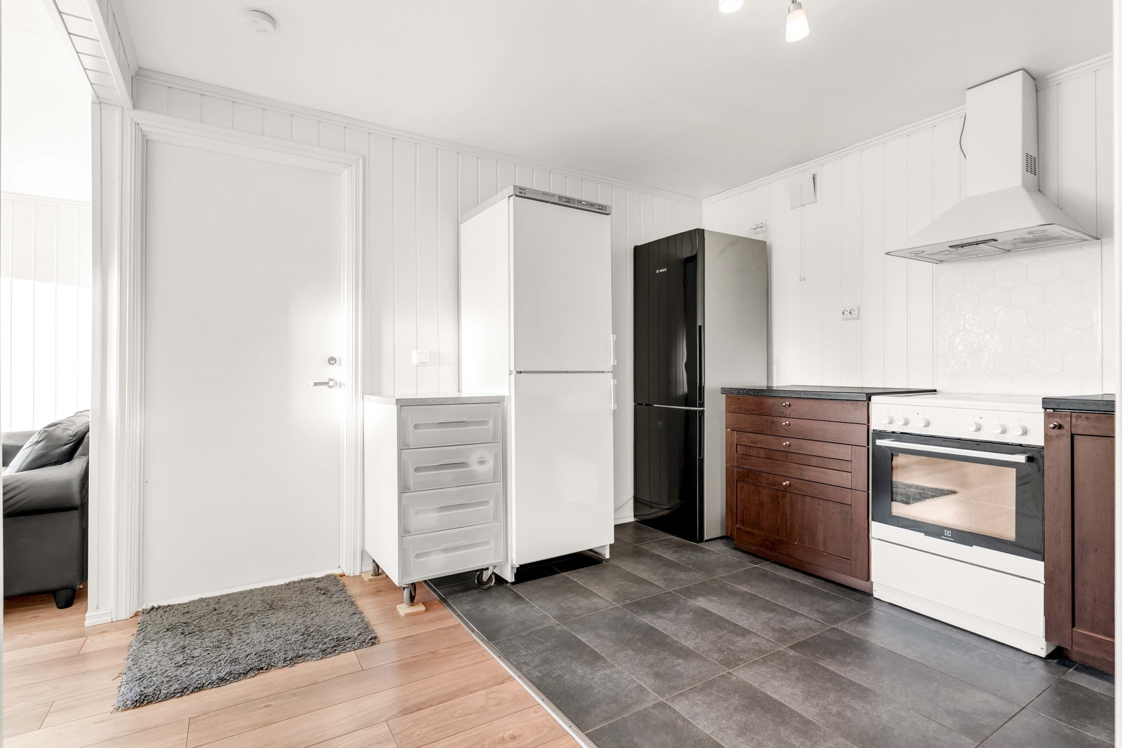 Åpen løsning mellom stuen og kjøkkenet gir en optimal arealutnyttelse. Galleribilde