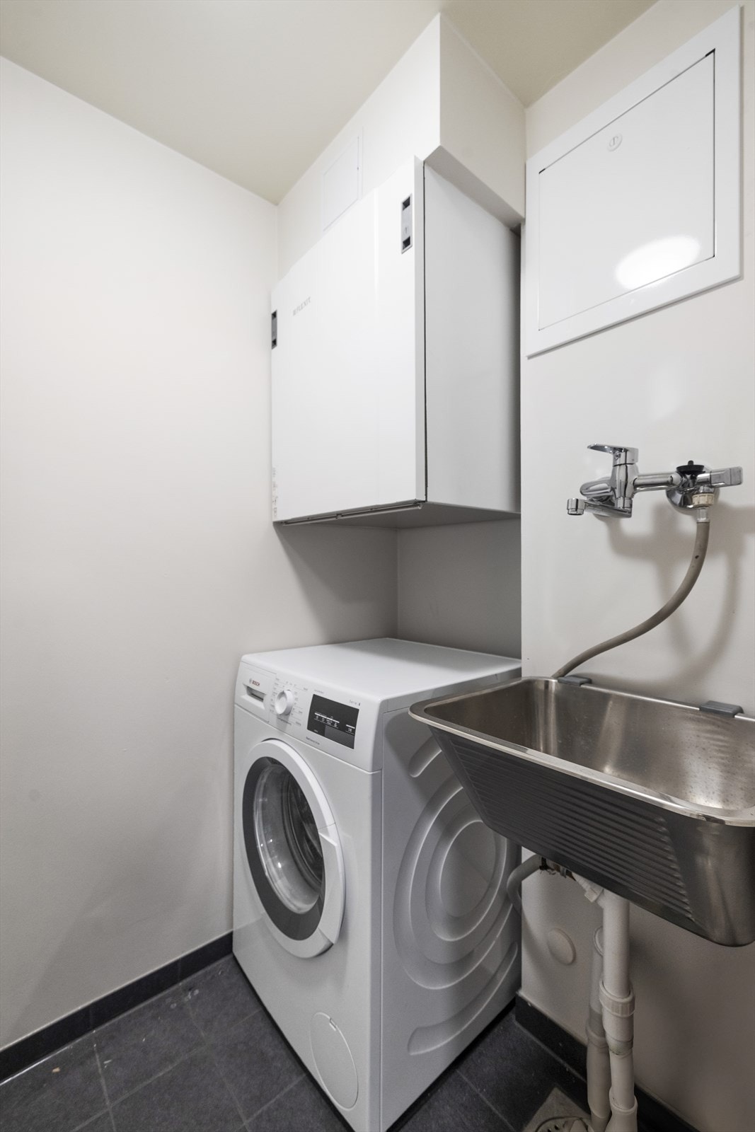 Separat vaskerom oppusset i regi av borettslaget i 2025 Galleribilde