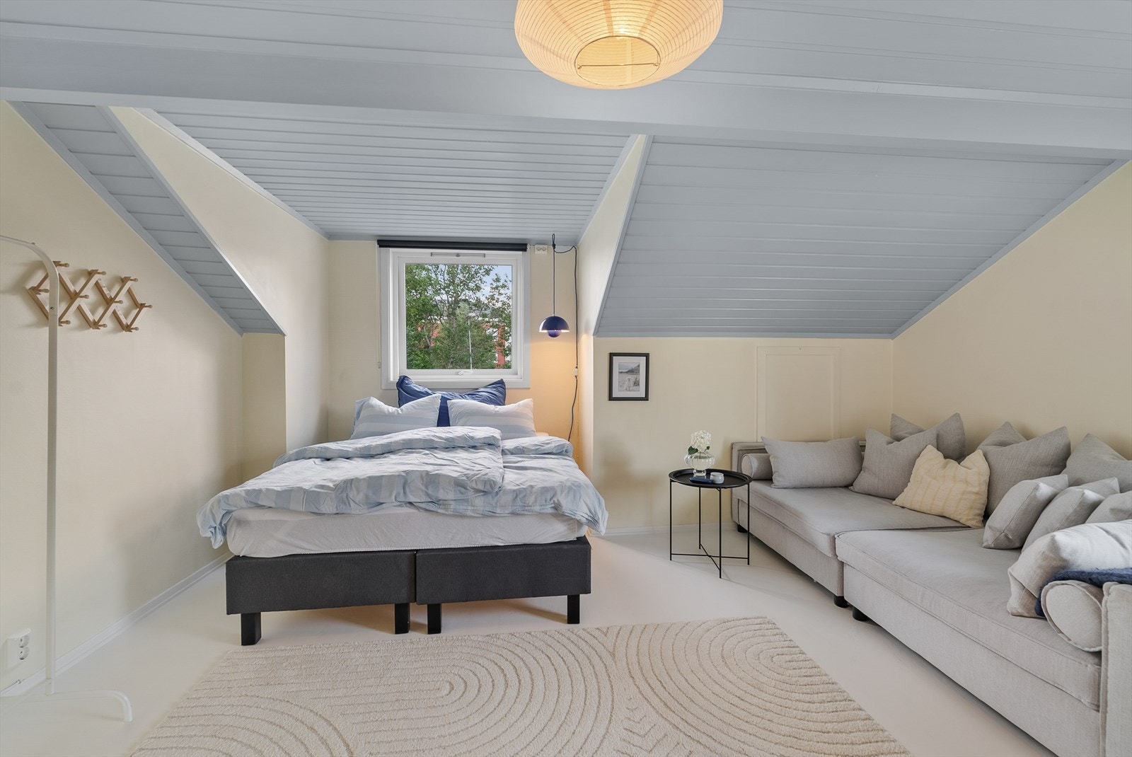 Det største soverommet i etasjen har også en sofalounge. Galleribilde