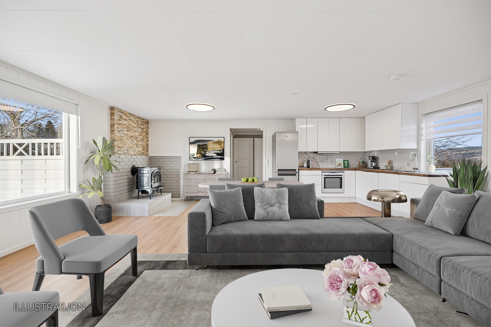 Gjennomgående laminatgulv og nymalte overflater fra 2025 skaper et helhetlig inntrykk. Galleribilde