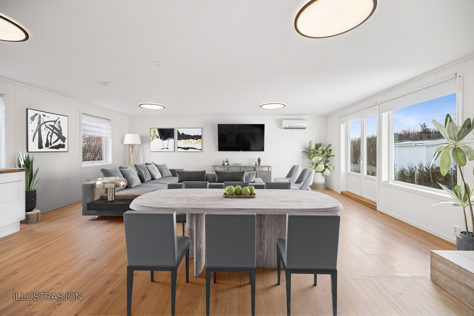 Den åpne stue- og kjøkkenløsningen gir en luftig og sosial atmosfære. Galleribilde