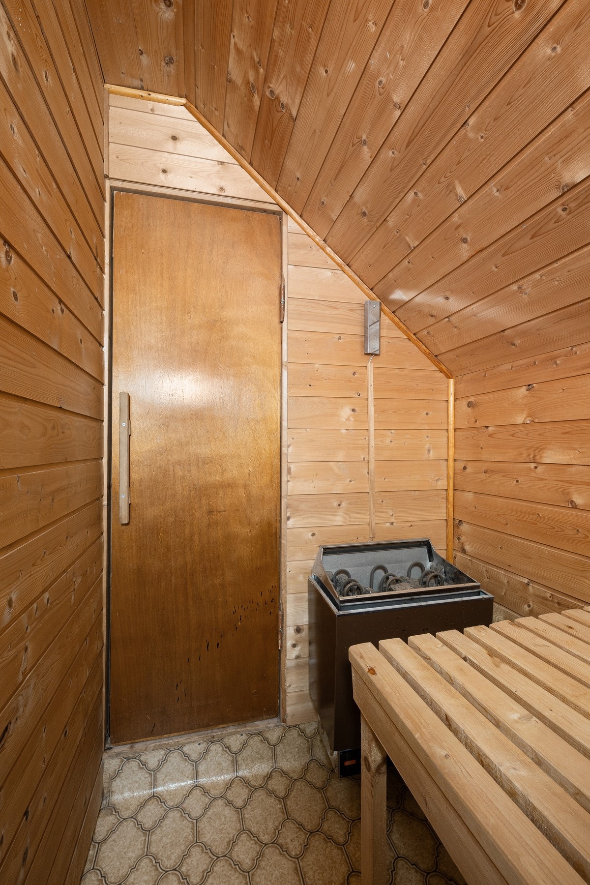 På badet har man inngang til badestue. Galleribilde