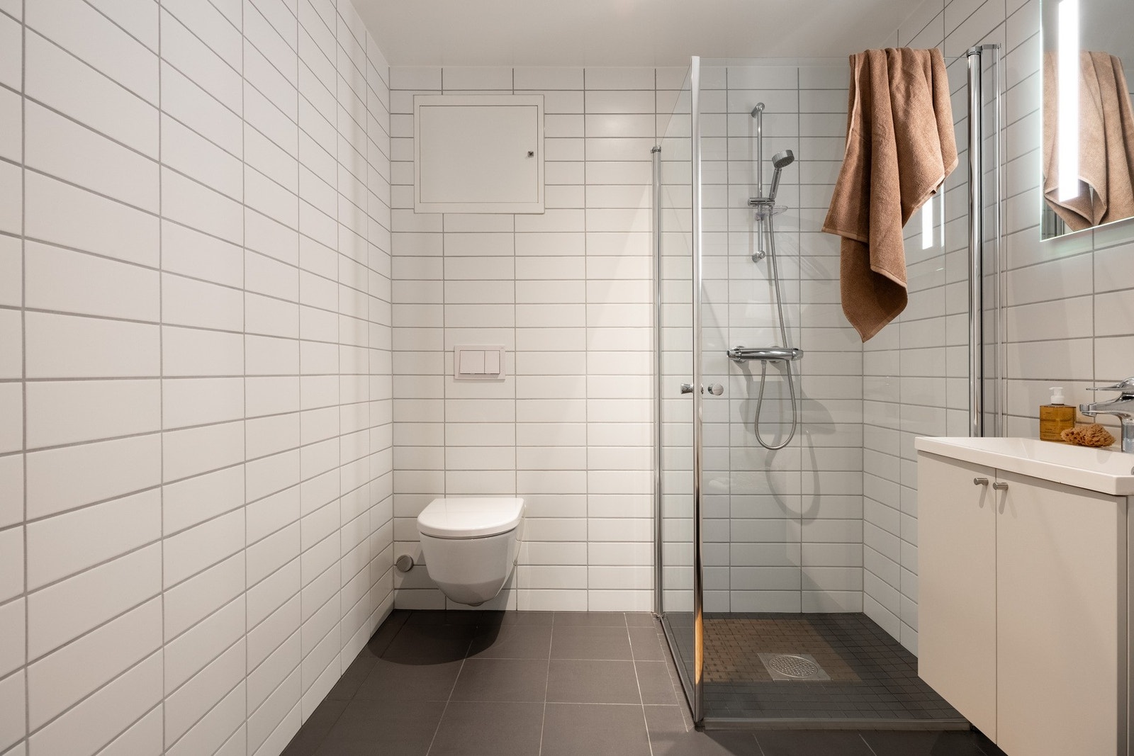 Badet har opplegg for vaskemaskin. Galleribilde