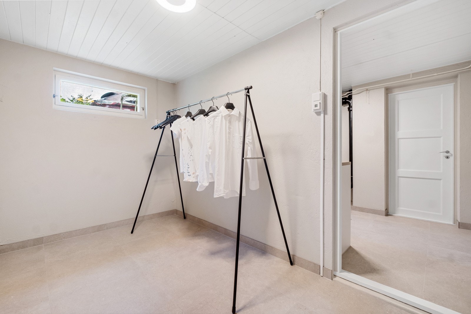 Innenfor vaskerommet er det eget tørkerom Galleribilde