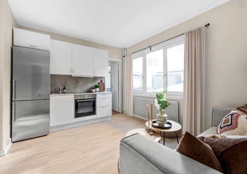 Stue med åpen kjøkkenløsning. Galleribilde