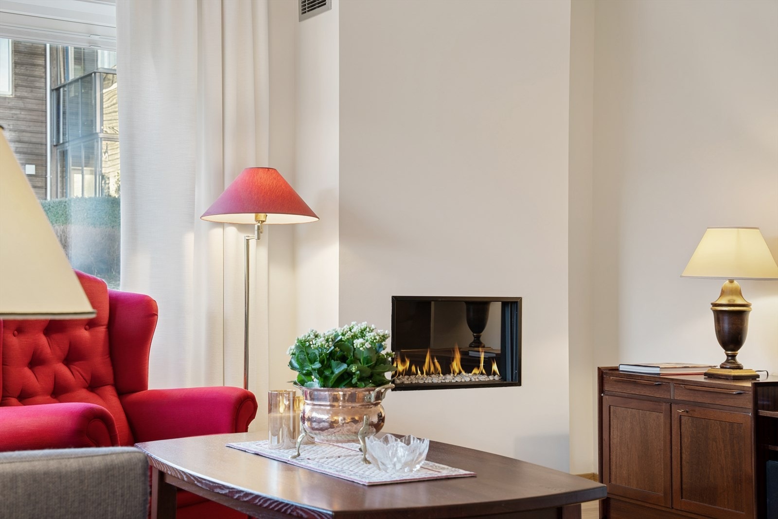 Hyggelig gasspeis i stuen som skaper god stemning Galleribilde