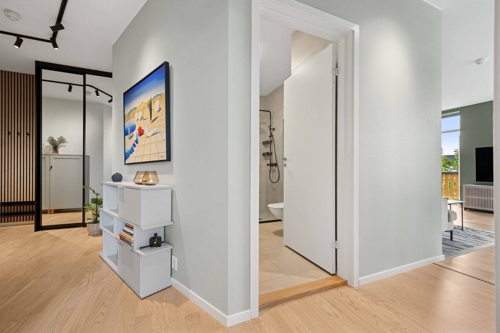 Gangen binder sammen alle leilighetens rom. Galleribilde