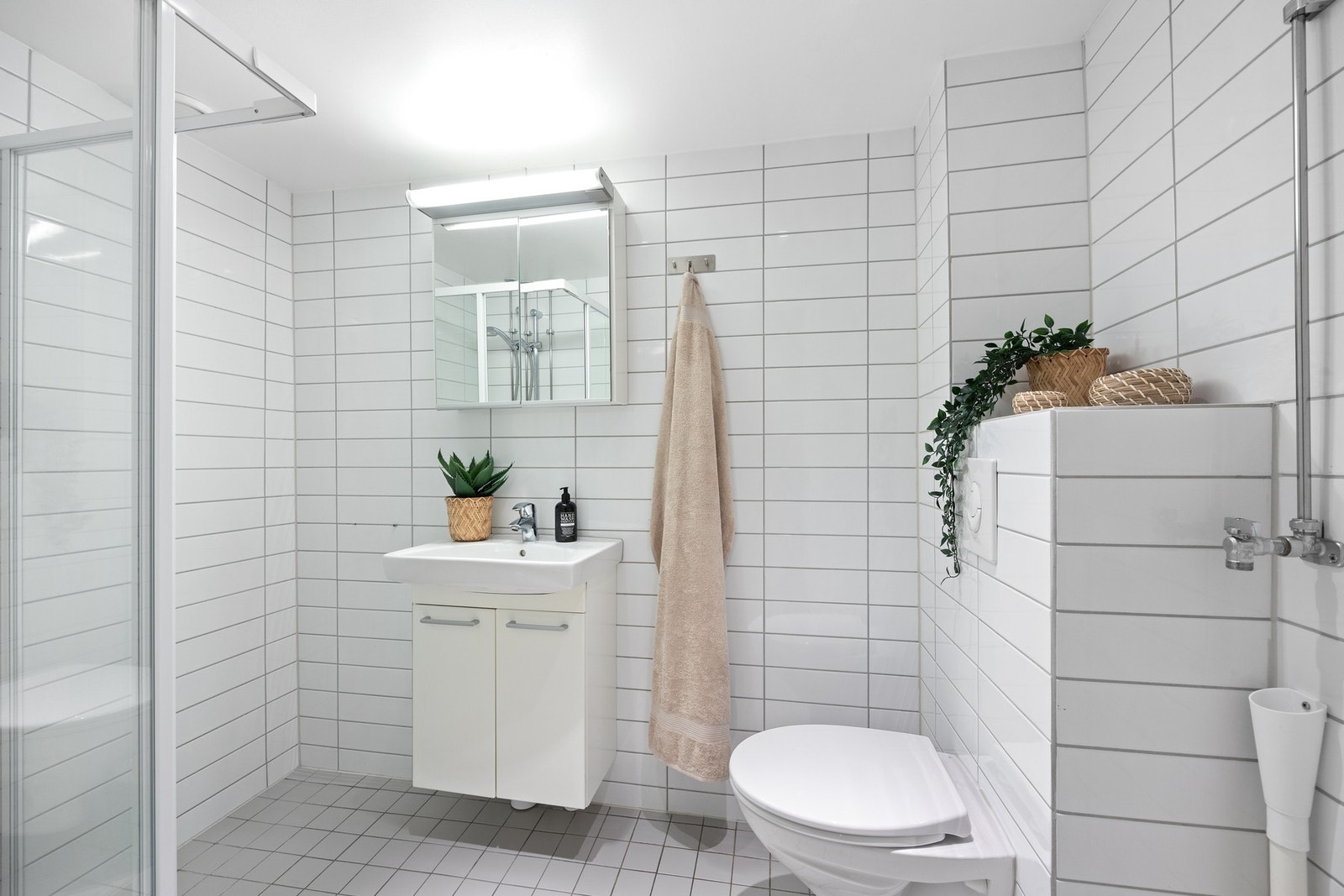 Flislagt baderom som ble renovert i forbindelse med ombygging ca. 2011. Galleribilde