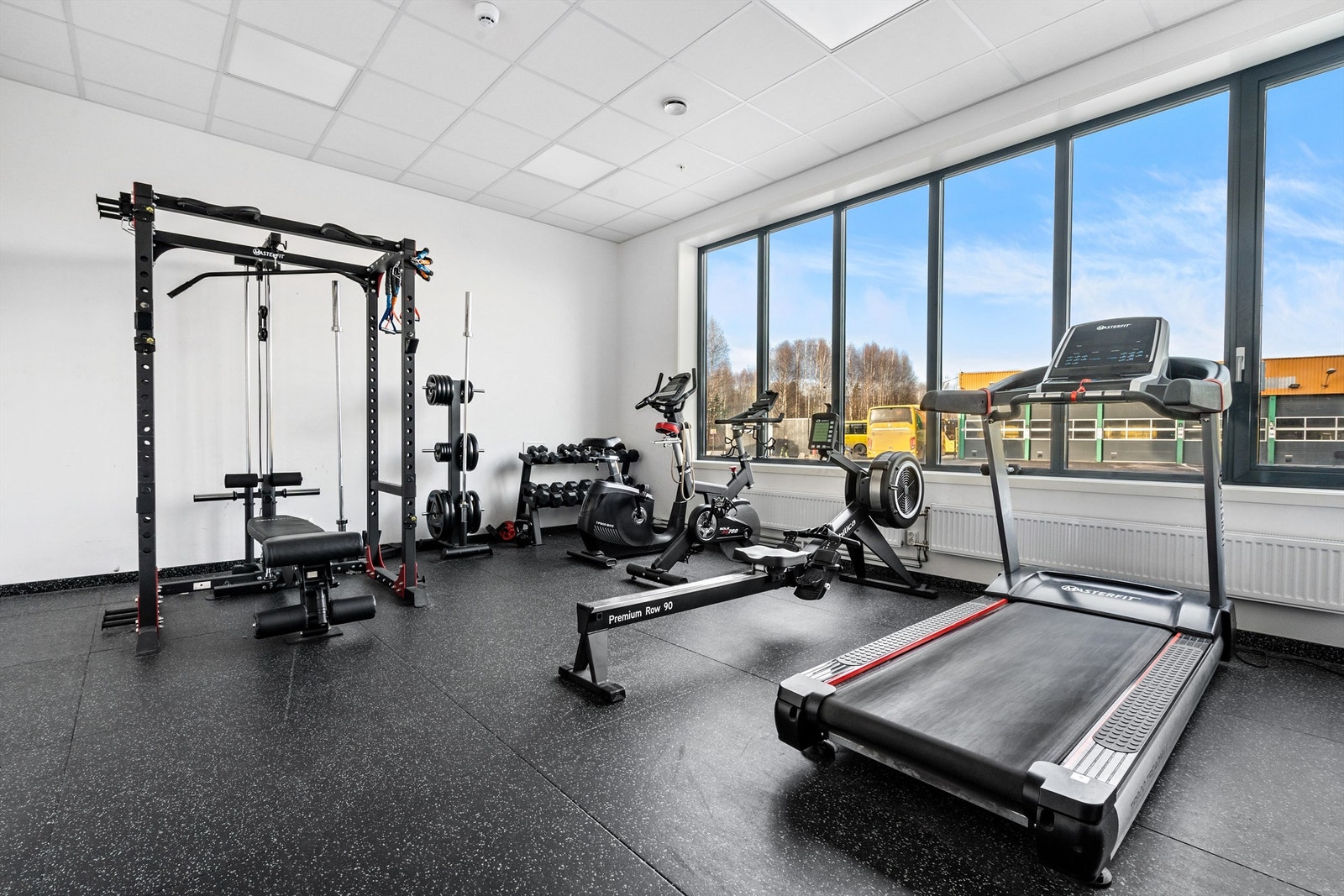 Det er eget flott treningsrom i bygget for beboerne Galleribilde