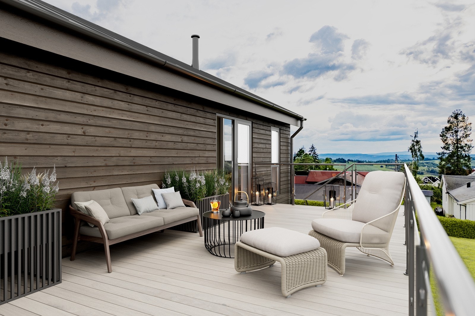 Fra stuen er det adkomst til en stor terrasse over garasjen. Galleribilde