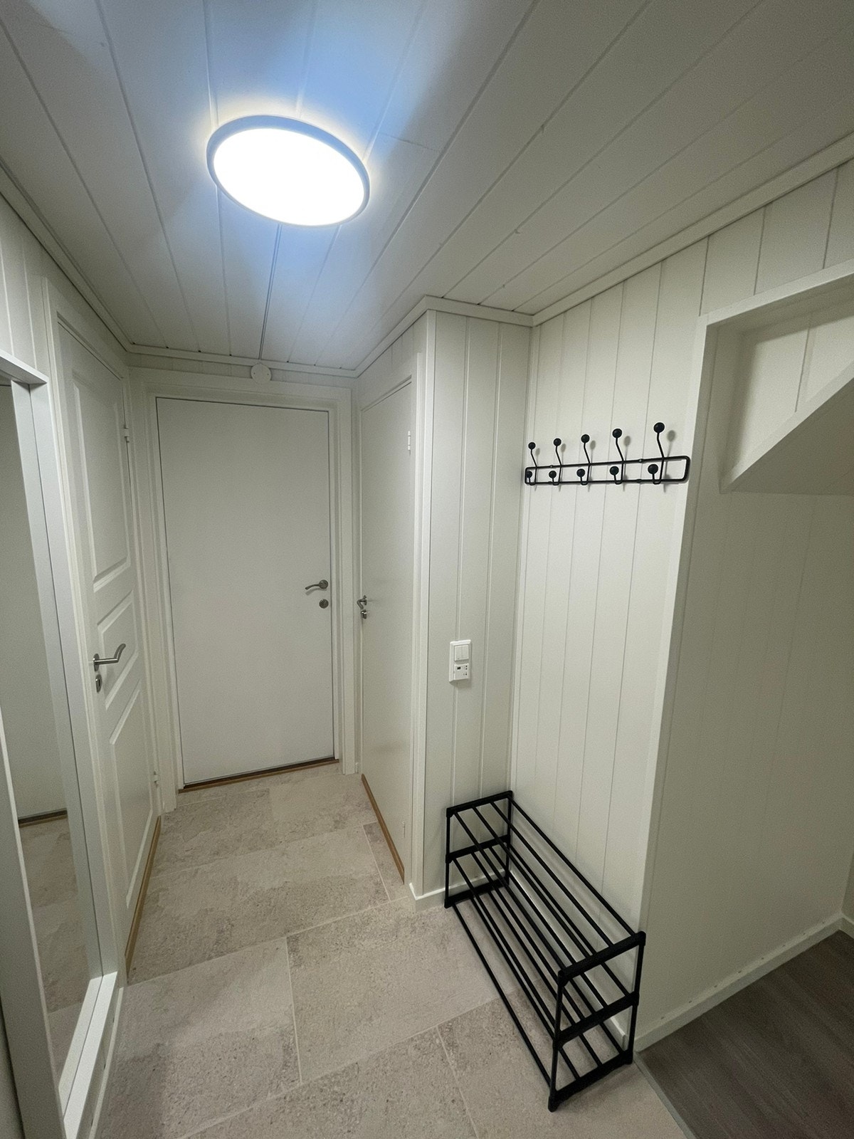 Inngangsparti med fliser og varmekabler Galleribilde