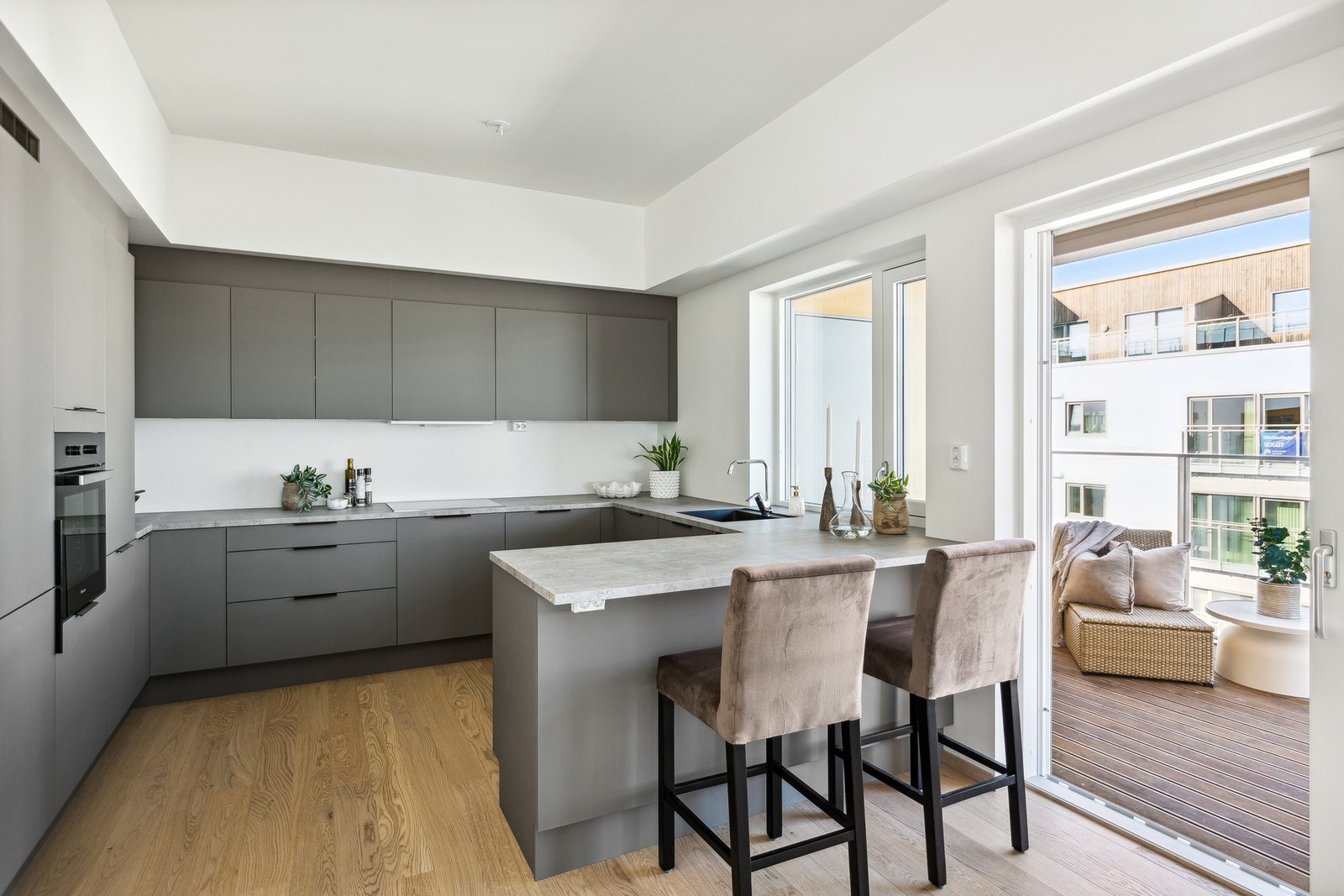 Kvalitetskjøkken i delikate material - og fargevalg. Galleribilde