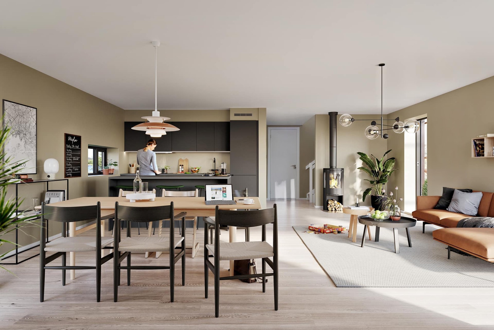 Åpen stue- og kjøkkenløsning utgang til uteplass på bakkeplan (illustrasjonsbilde) Galleribilde