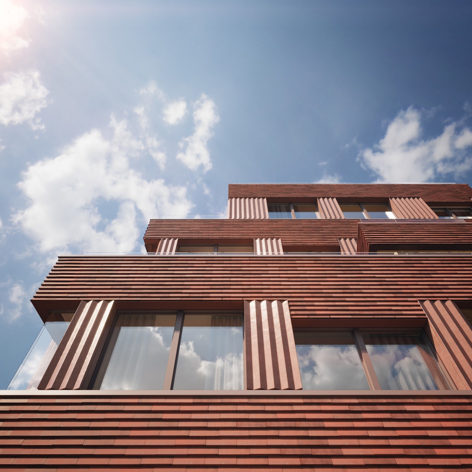 Bygningene får et utseende som er tegnet både for å utnytte den spennende tomten best mulig, og samtidig passe inn i omgivelsene. Husene kles med vertikale terrakottaplater og horisontalt skjermtegl. Galleribilde