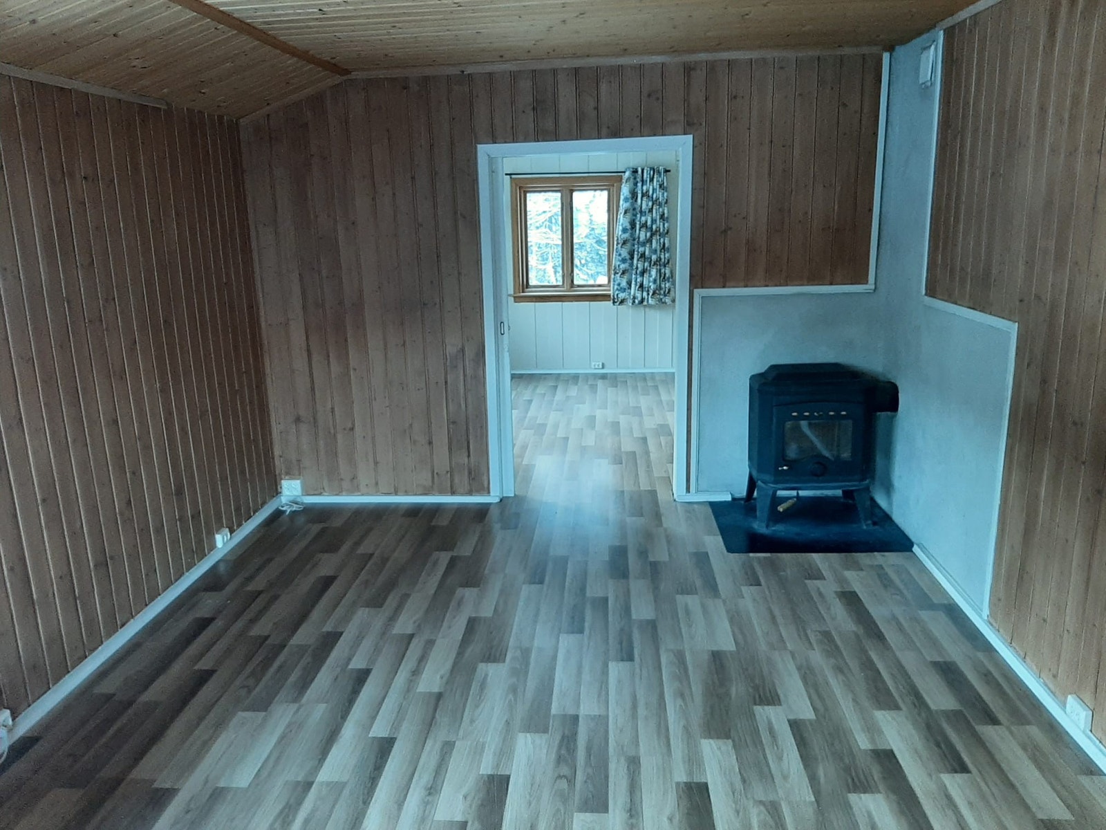 stue med ekte peis Galleribilde