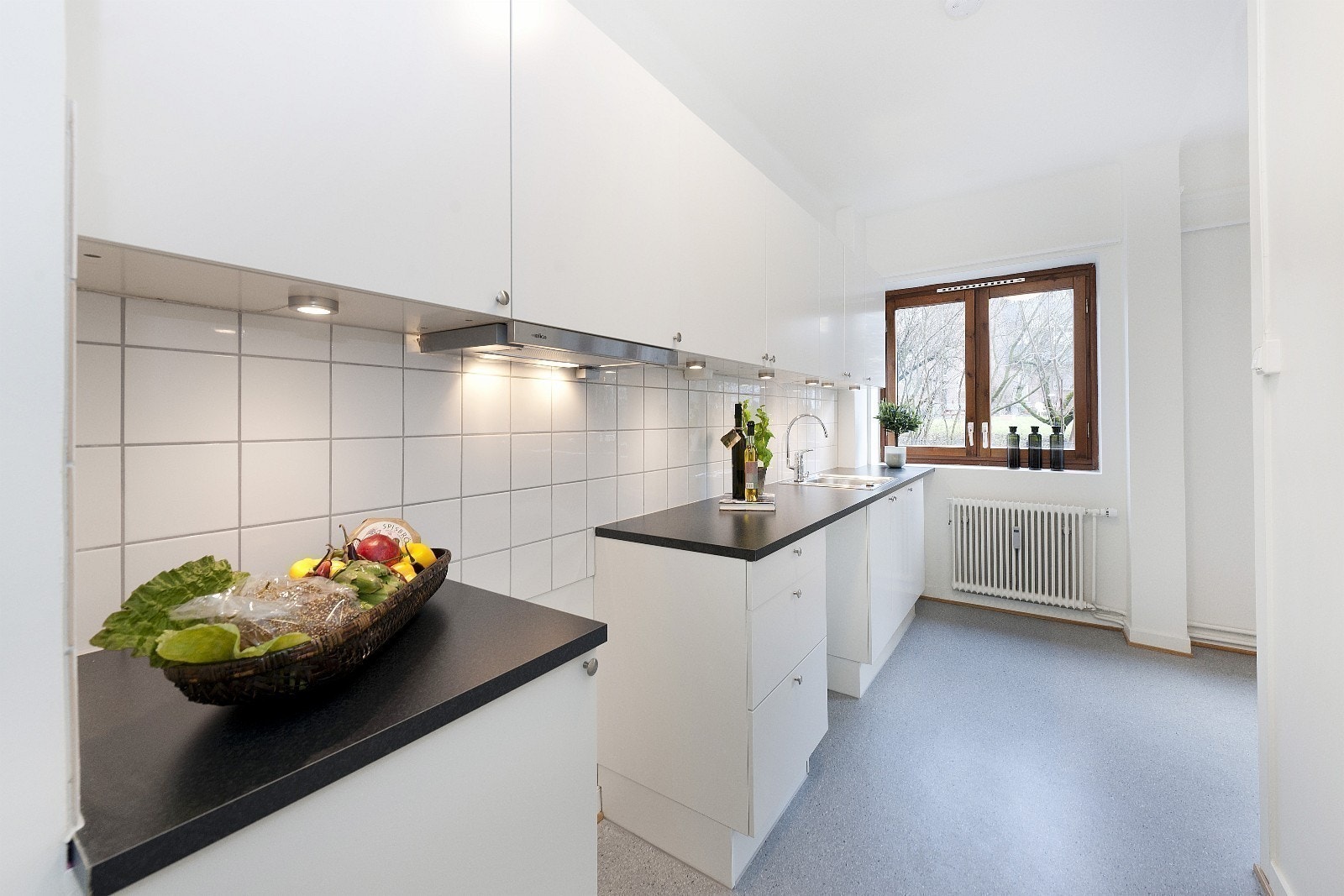 Kjøkken
Bilde fra tilsvarende leilighet, med annet type gulv. Galleribilde