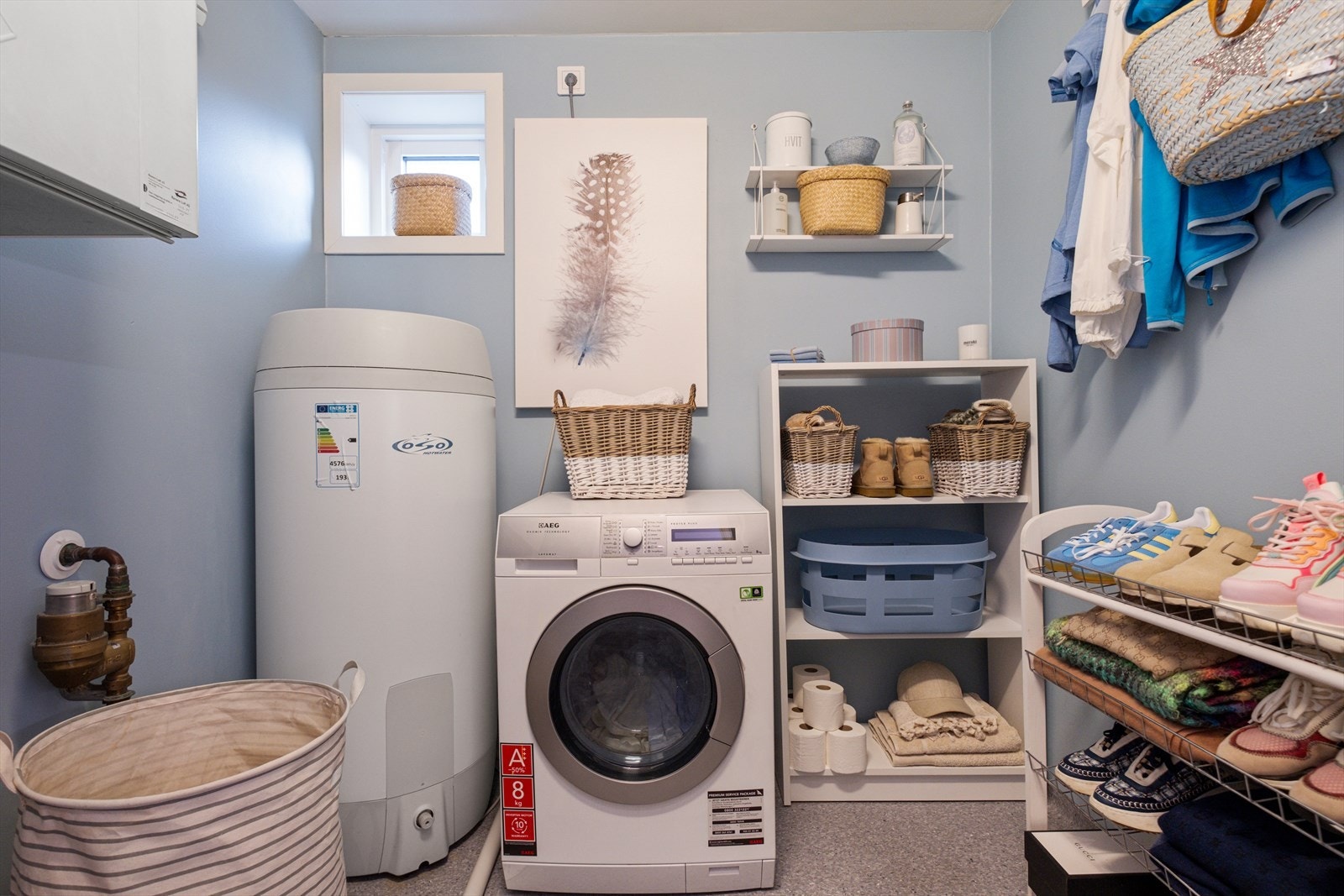 Leiligheten har eget vaskerom som ligger i tilknytning til badet Galleribilde