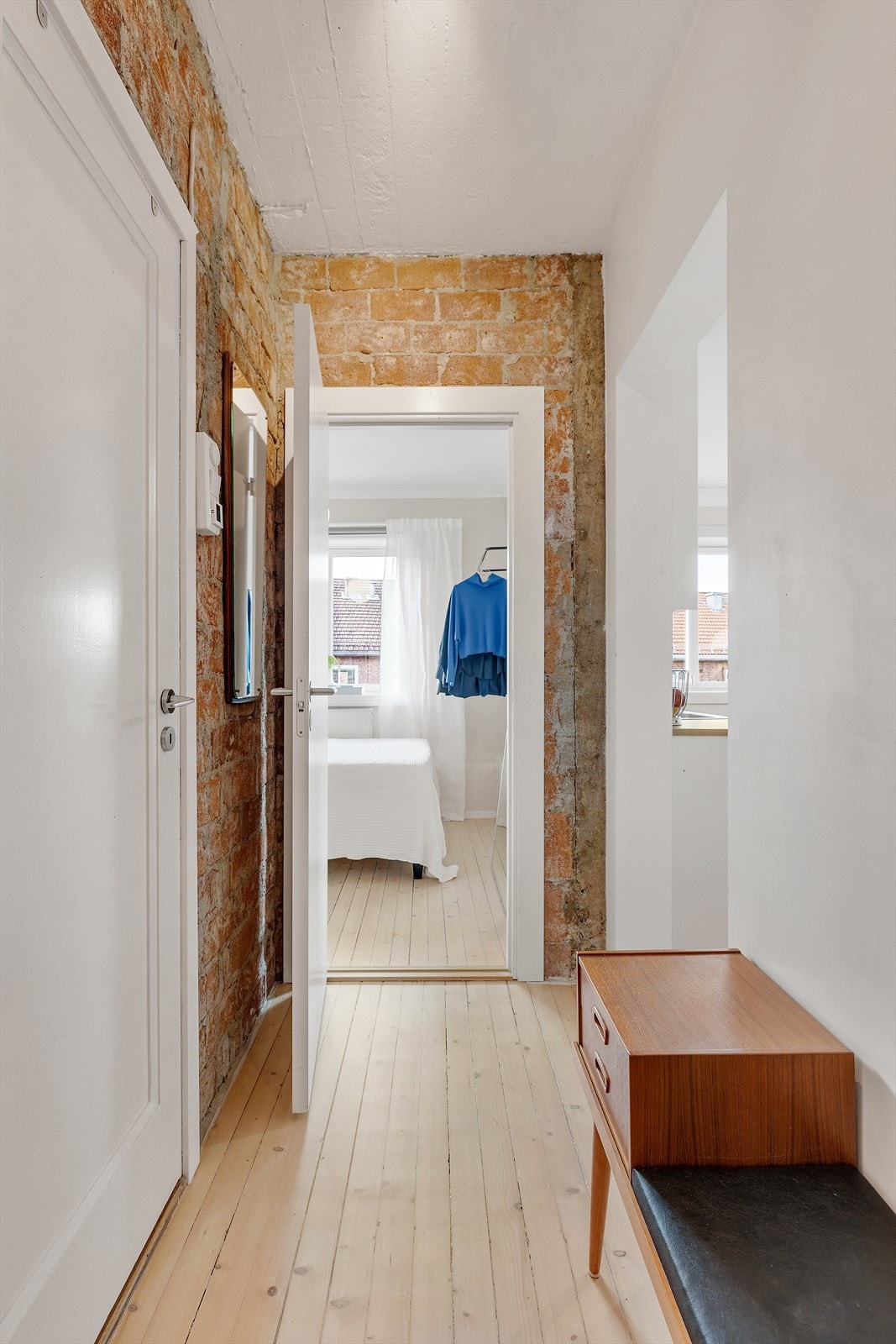 Flere pene detaljer i leiligheten som blant annet denne murveggen. Galleribilde