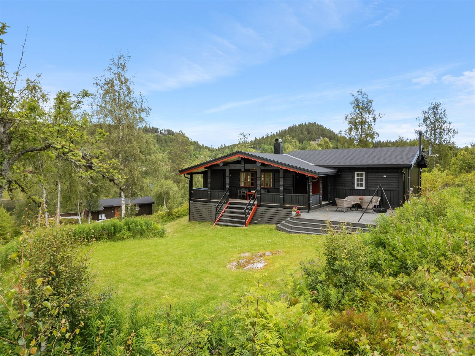 Koselig hytte med hyggelige uteområder - like fint sommer som vinter Galleribilde