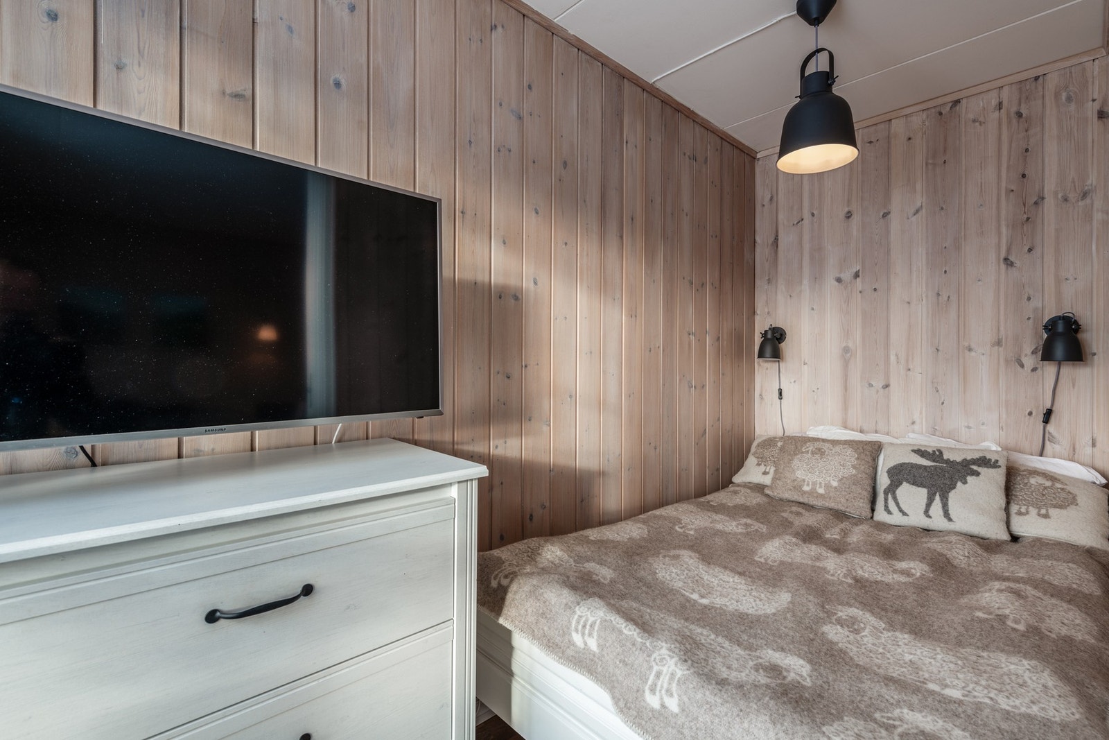 De lune veggene gir rommet en behagelig atmosfære Galleribilde