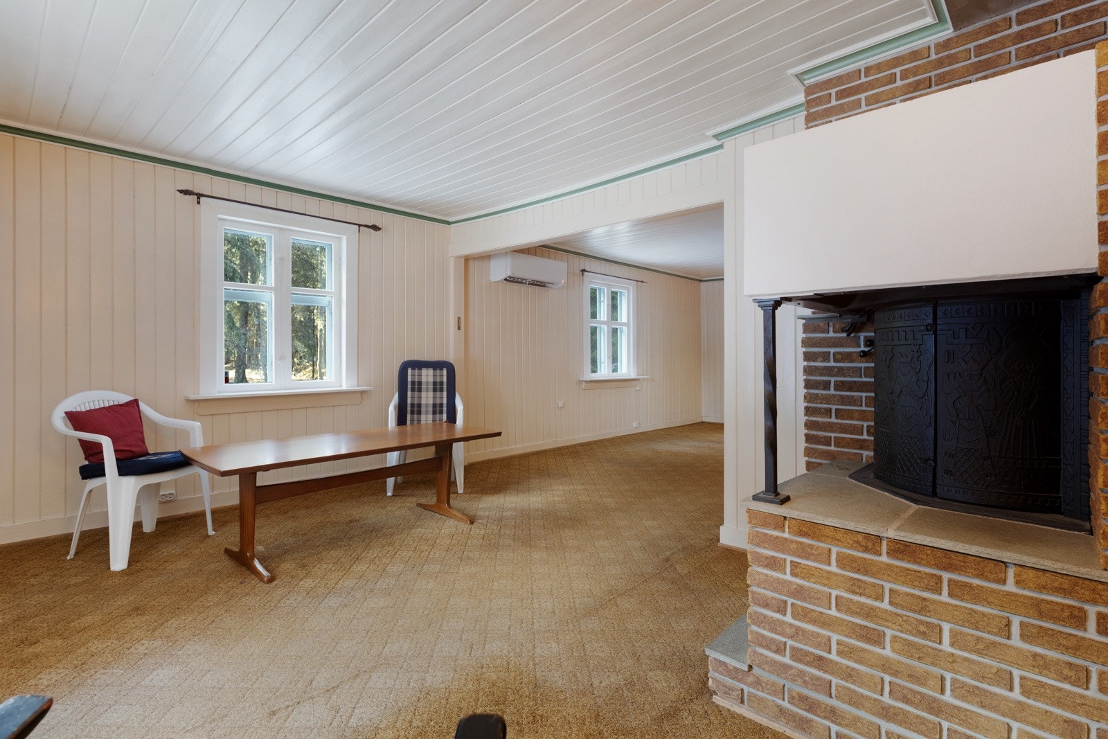 God plass til sofaløsning med tilhørende møblement i flere soner. Galleribilde