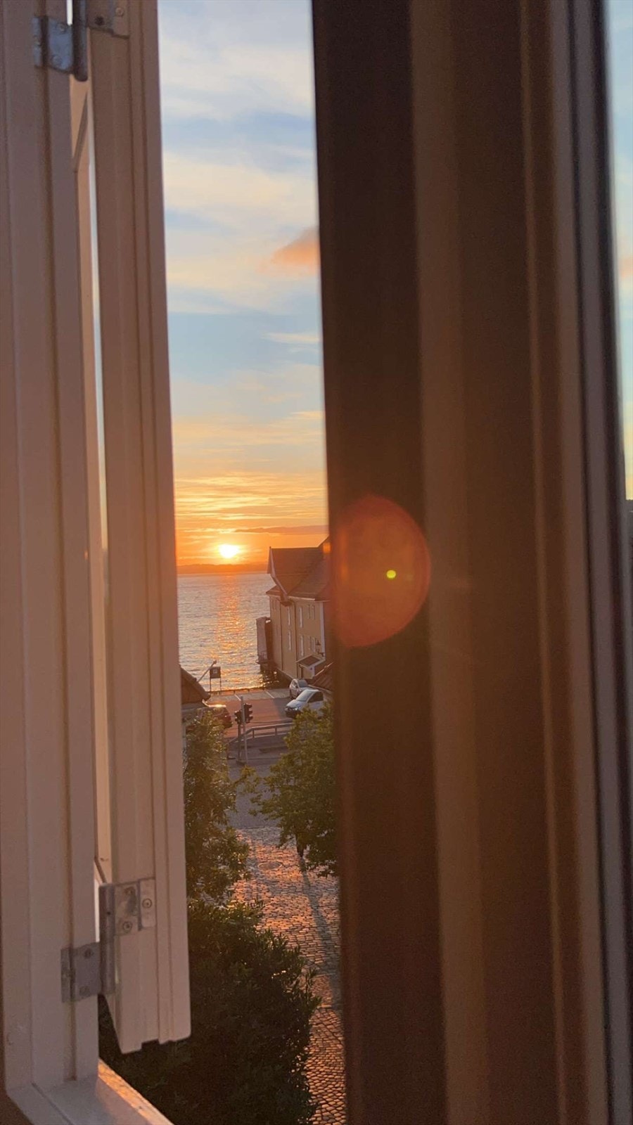 - Nyt fantastiske solnedganger fra eget hjem - Galleribilde