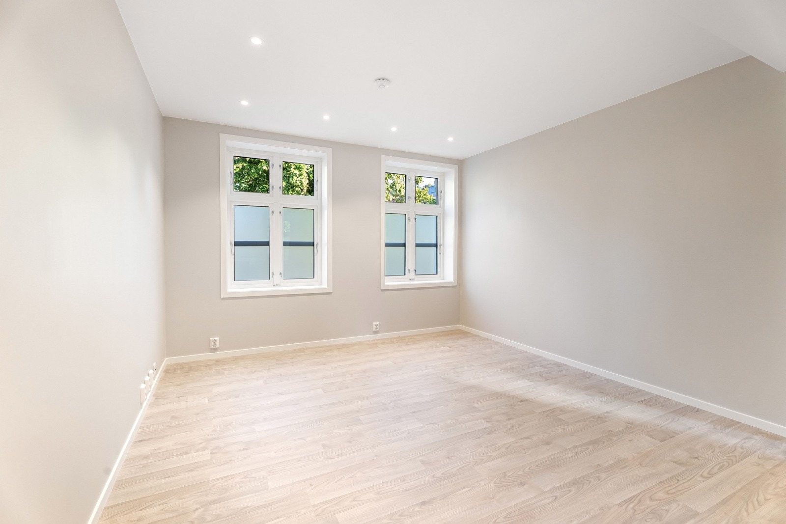 Leilighet 2. Romslig stue med lyse farger. Galleribilde