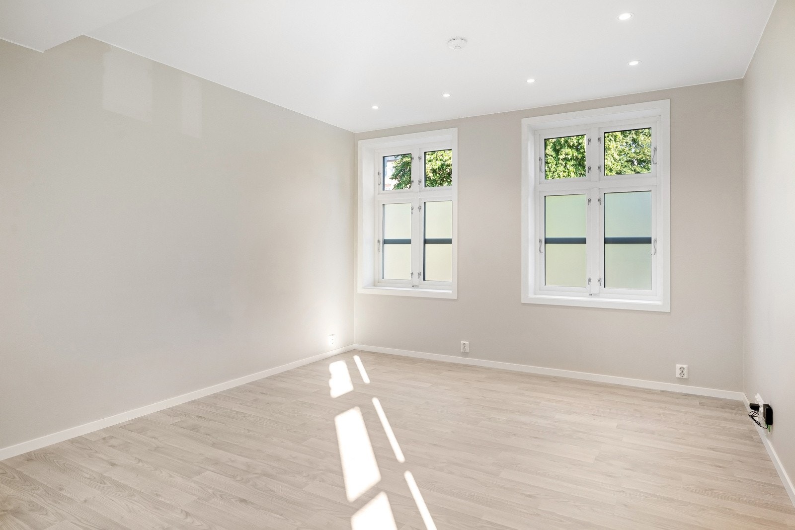 Leilighet 1. Romslig stue med lyse farger. Galleribilde