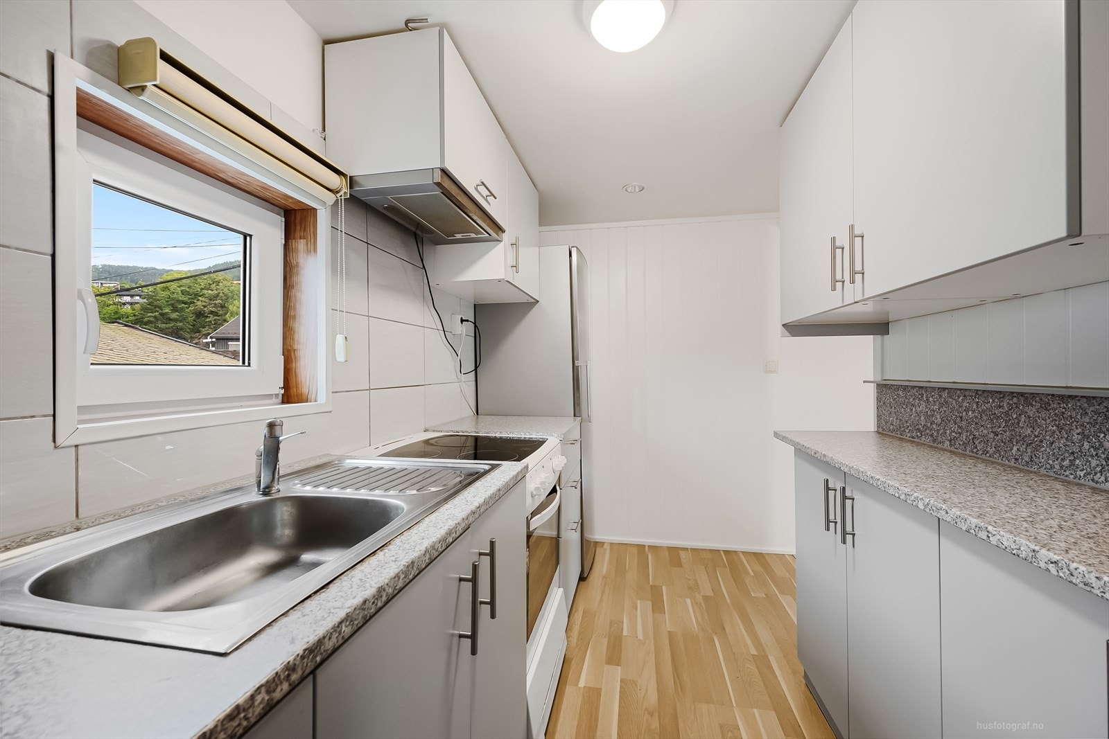 Innredet rom med kjøkkeninnredning. Galleribilde