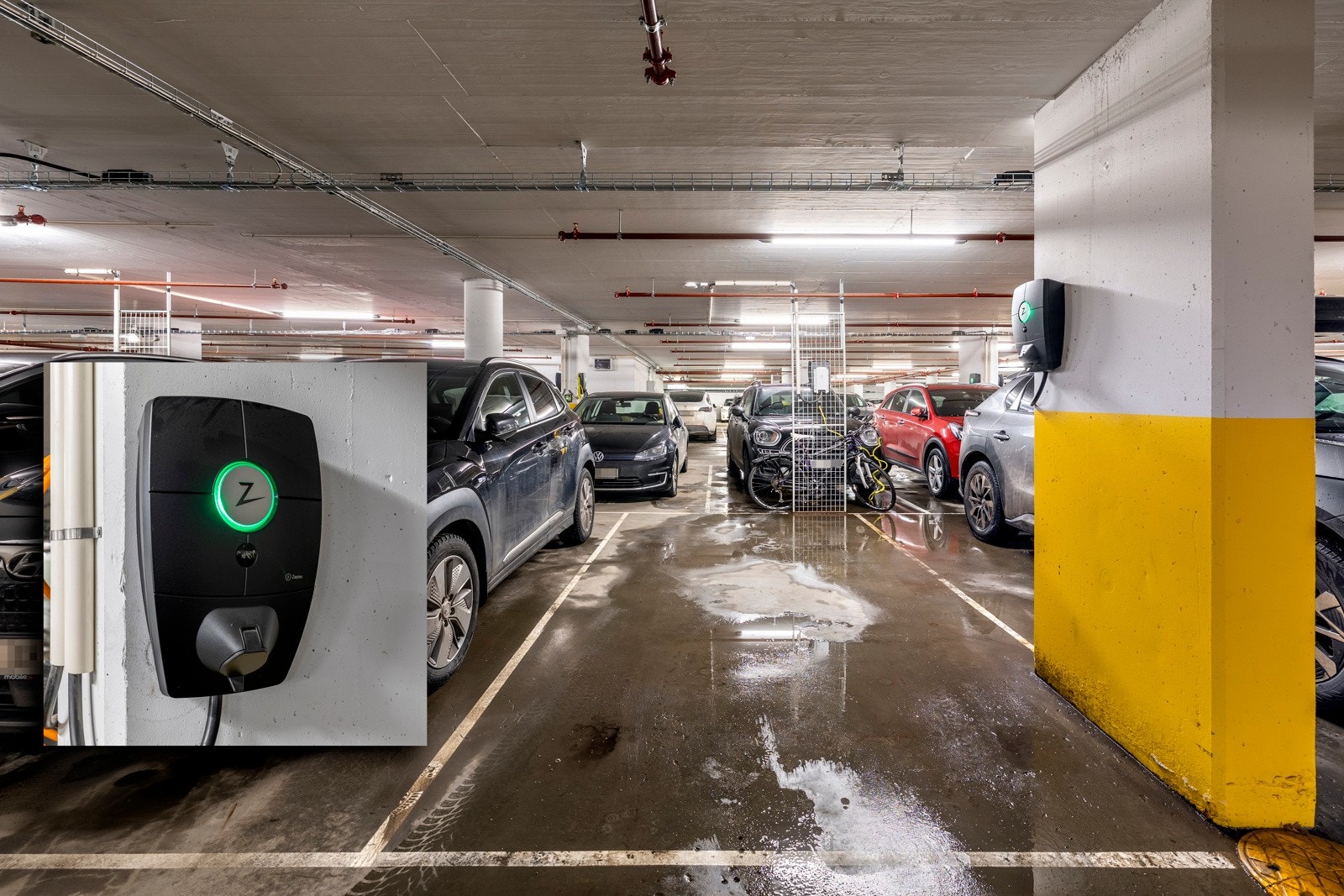 Det medfølger garasjeplass med el-billader. Galleribilde