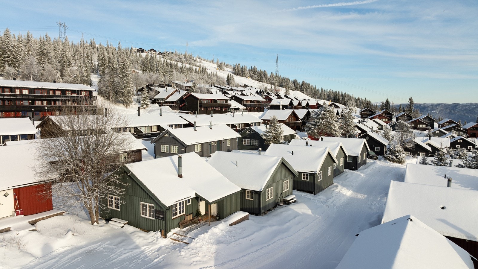 Hyttefeltet ligger midt i alpinbakken, og byr på ski-in/ski-out. Galleribilde