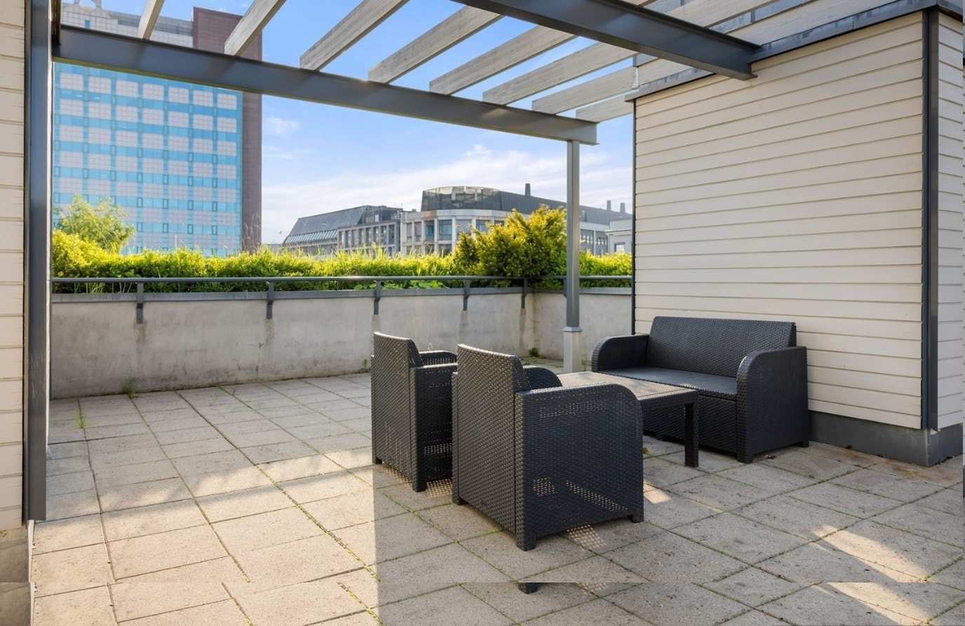 Beboerne disponerer en flott, felles takterrasse Galleribilde