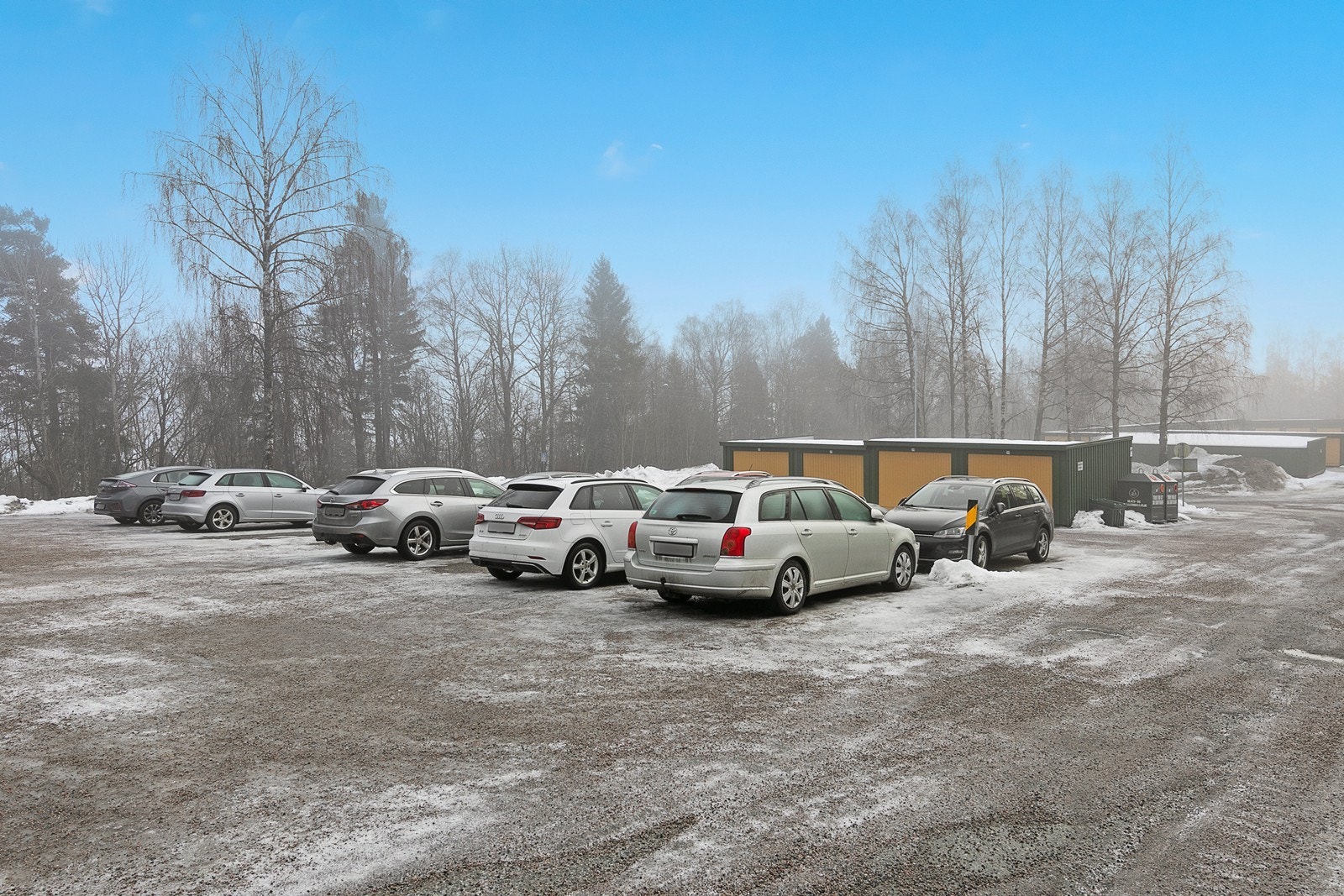 Felles parkeringsplass for borettslagene på området Galleribilde