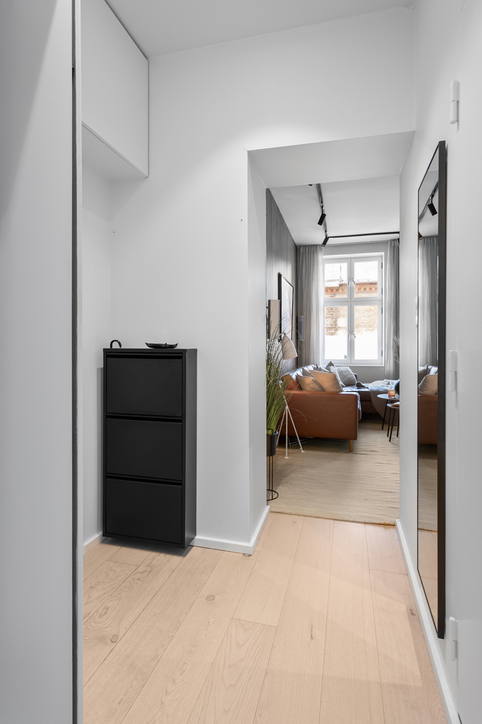 Entreen er utstyrt med praktiske oppbevaringsløsninger Galleribilde