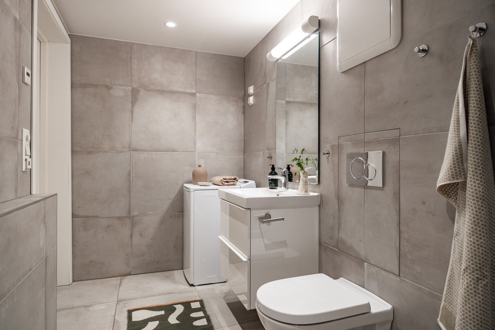 I hjørnet er det plass og opplegg for vaskemaskin. Galleribilde