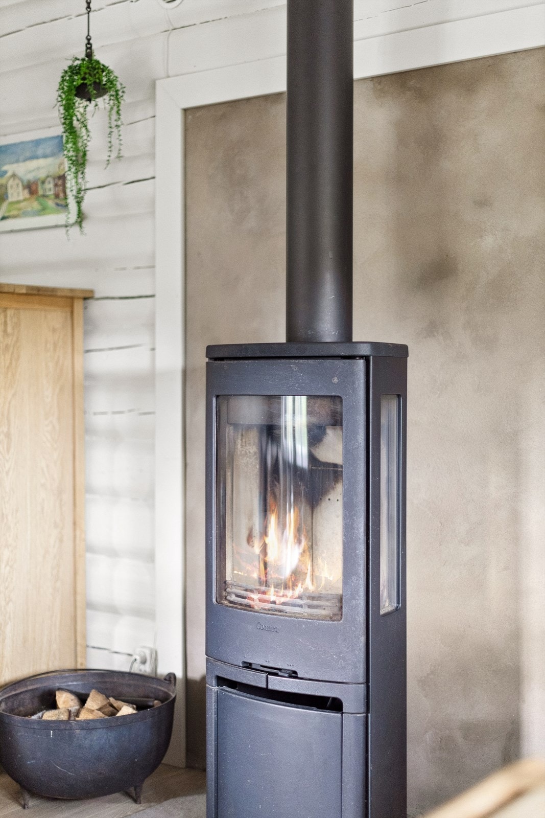 Vedovnen gir en lun og behagelig oppvarming på kalde dager. Galleribilde