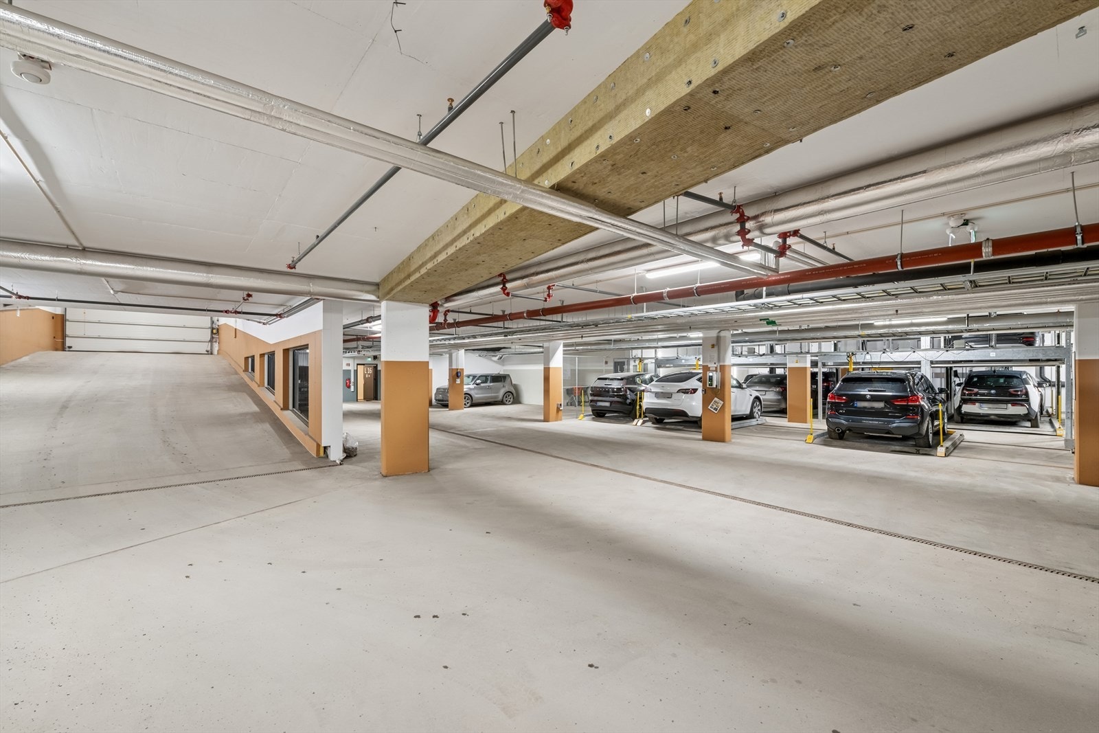 Garasjeanlegget. Her kan man leie parkeringsplass. Kjøper må selv kontakte Union Eiendomsutvikling for avtale og pris. Galleribilde