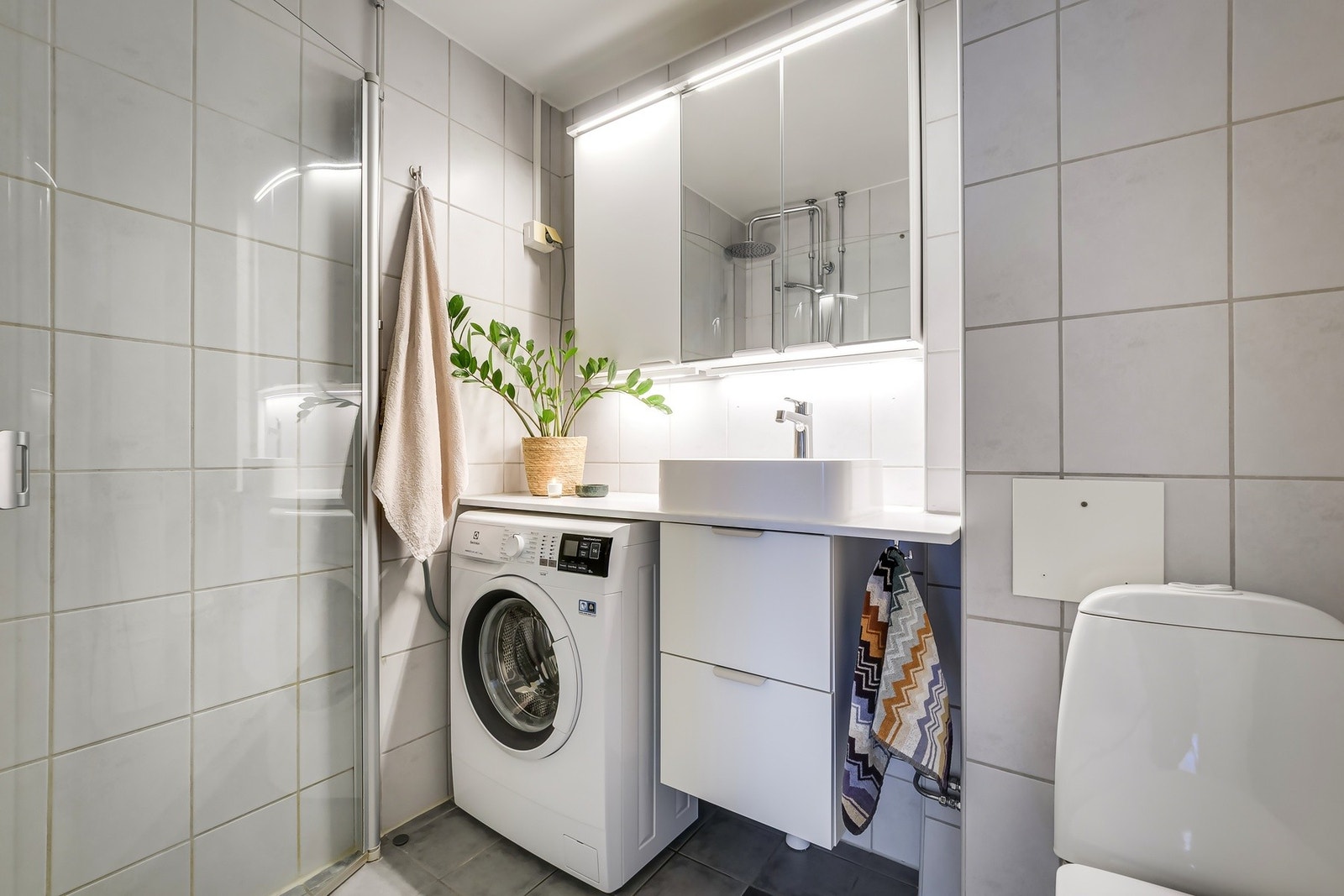 Flislagt bad som er tatt i regi av borettslaget. Galleribilde