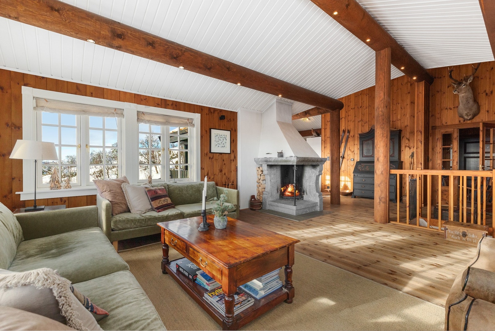 Klebersteins gruepeis som gir en hyggelig atmosfære til rommet Galleribilde