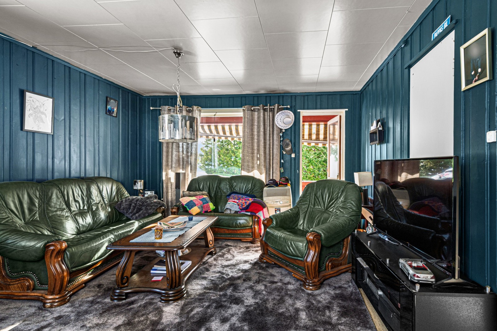 Enheten har en stor stue med utgang til terrassen. Galleribilde