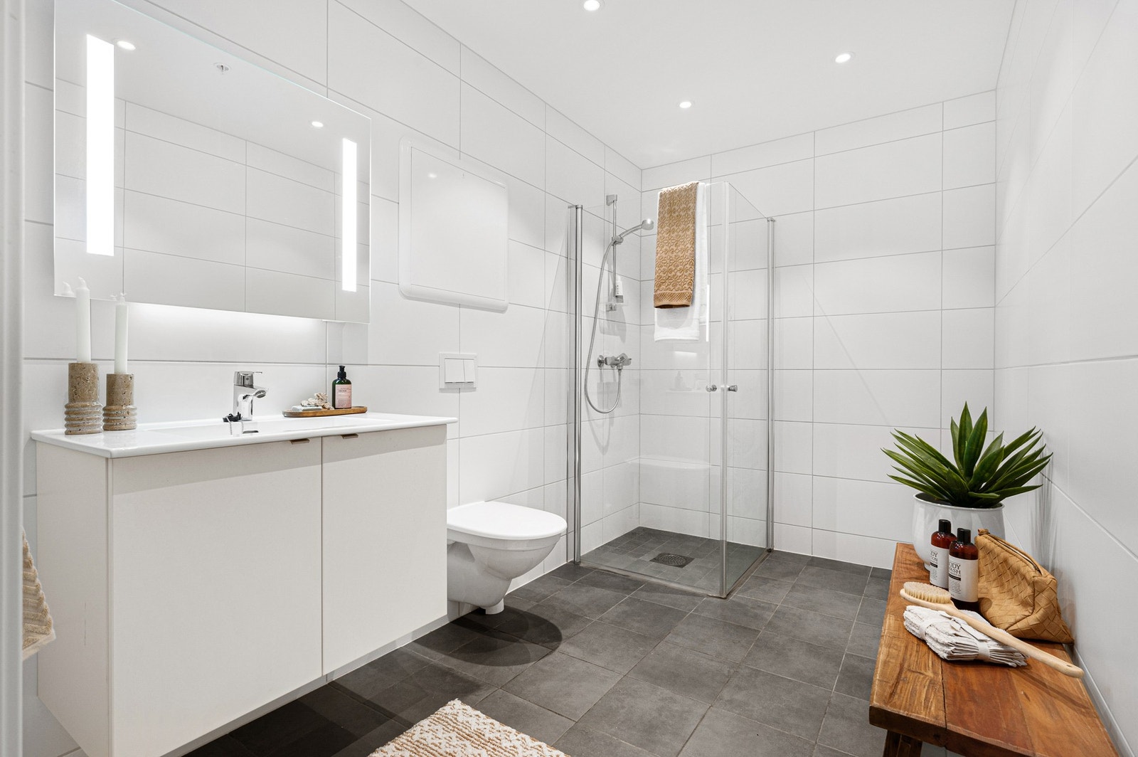 Leiligheten har 2 lekre flislagte bad som begge er tildelt TG 0 av takstmann. Galleribilde