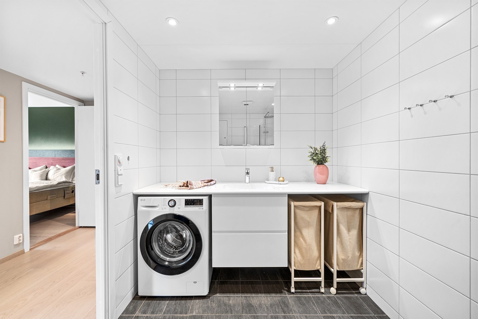 Et arealeffektiv bad med flere innredningsmuligheter. Galleribilde