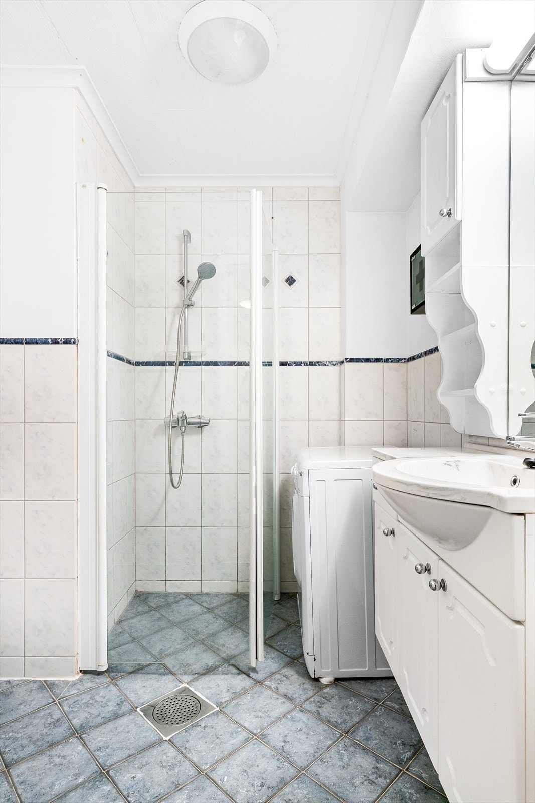 Badet har opplegg for vaskemaskin. Galleribilde