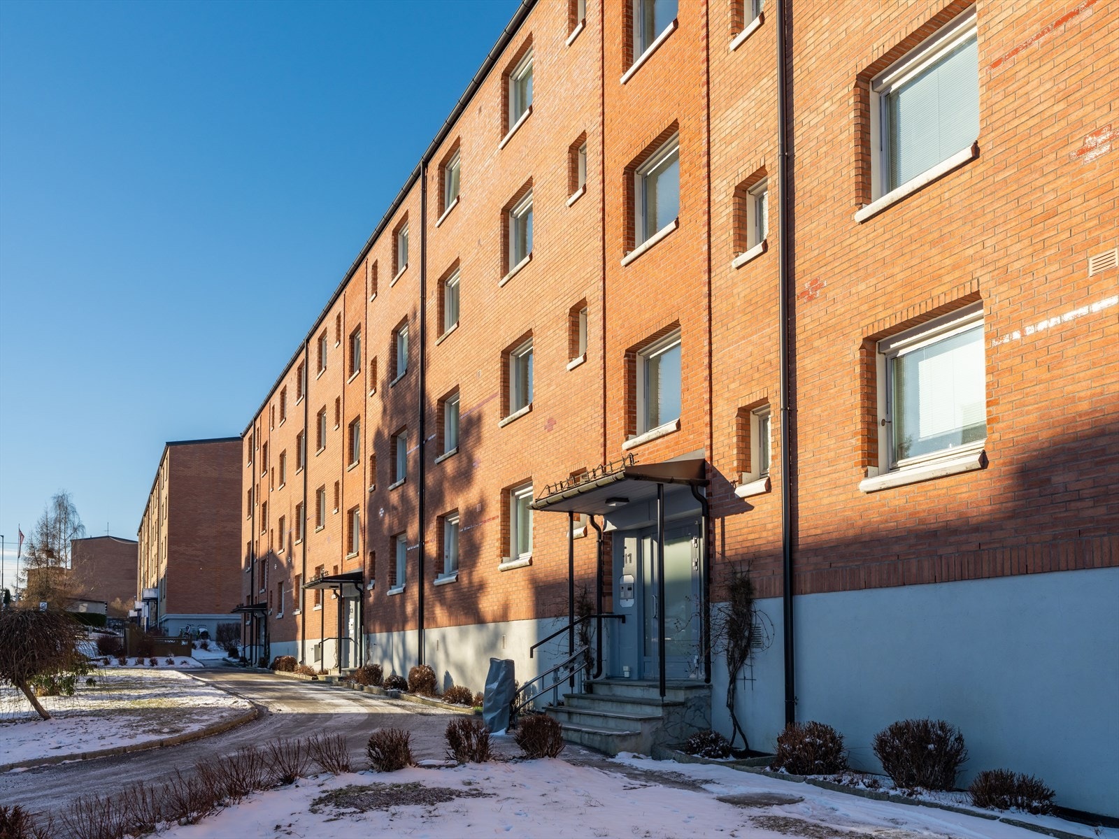 Felles inngangsparti som tar deg direkte opp til leiligheten. Galleribilde