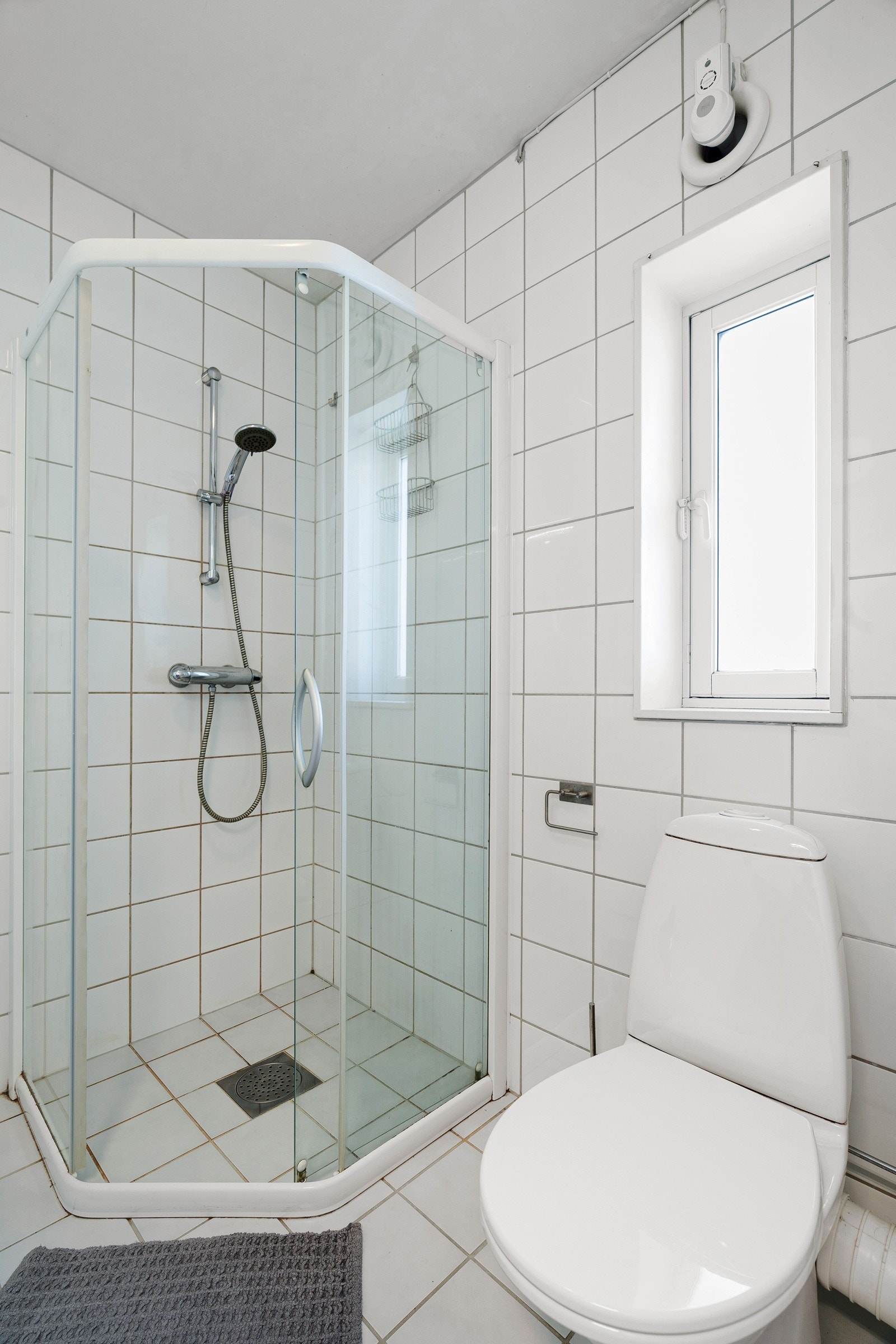 Flislagt bad med varme i gulv. Galleribilde